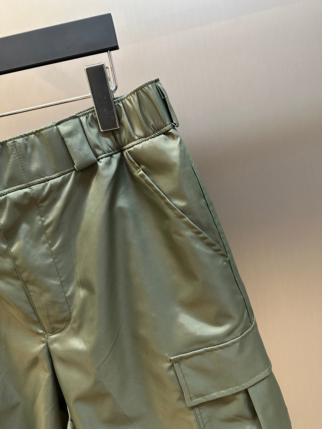 Olive cargo shorts with elastic waistband and belt loops