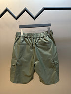 Olive cargo shorts with elastic waistband and cargo pockets