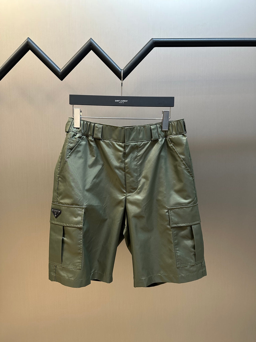 Olive cargo shorts with PRADA patch, elastic drawstring waist, side pockets
