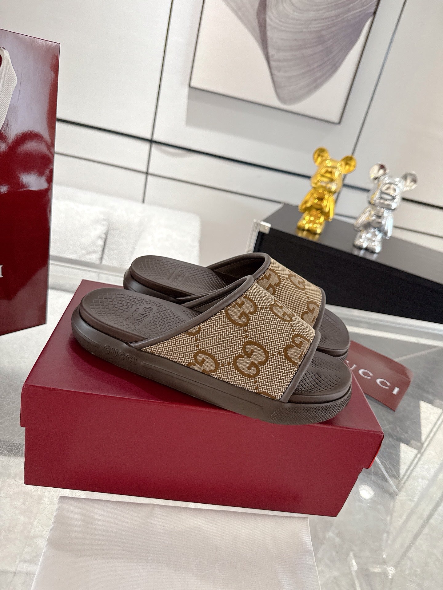 Gucci GG canvas slide sandals with dark brown footbed