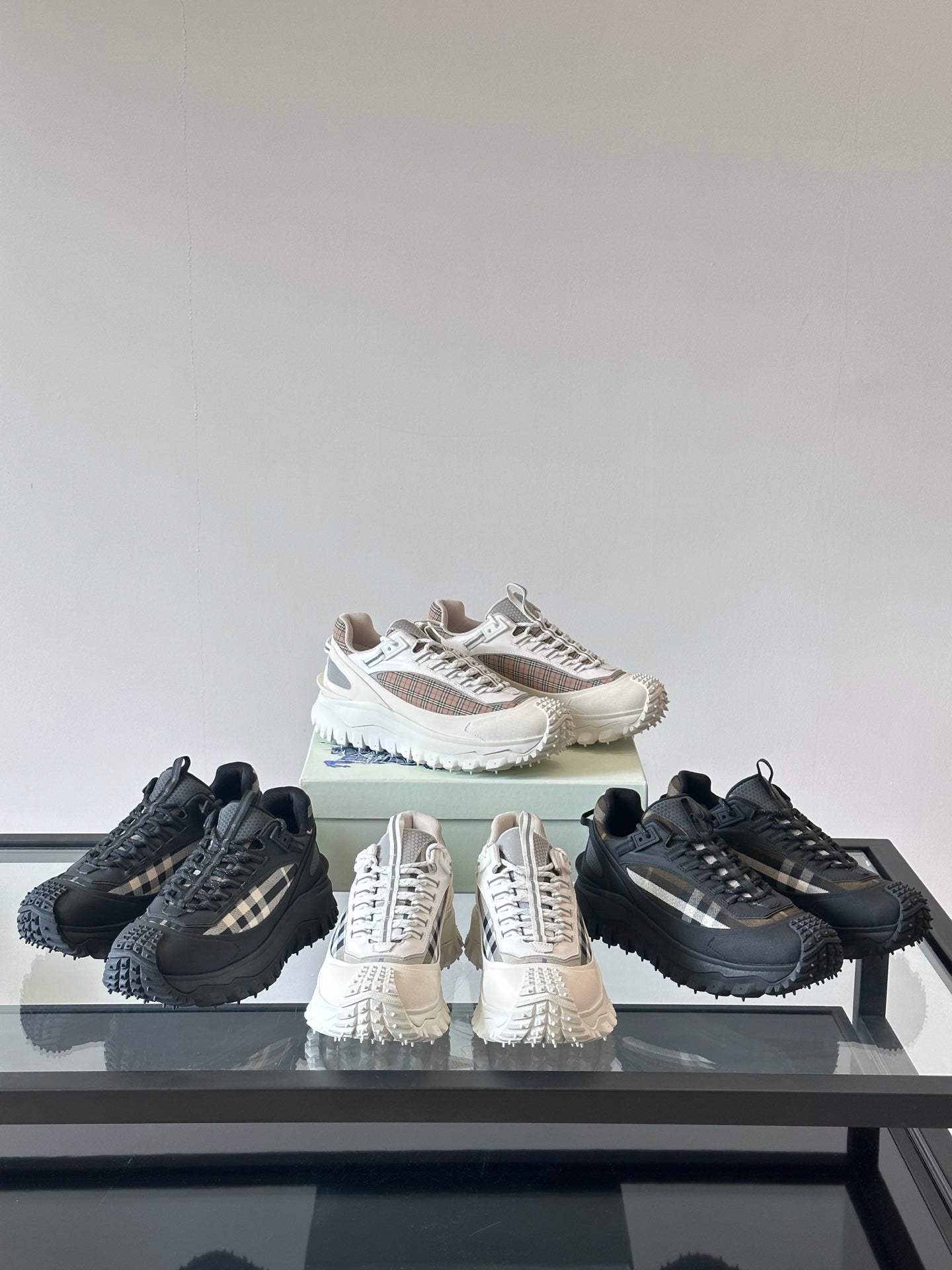 Mixed-color lace-up chunky sneakers set: black, cream, and patterned uppers
