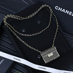 Chanel small flap crossbody bag with silver ring-mesh front and gold chain strap