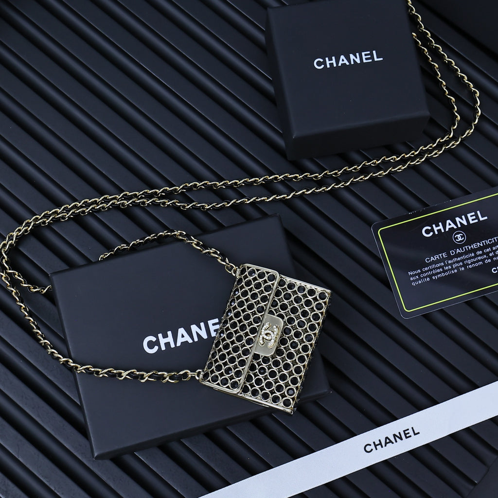 Chanel mini flap bag with silver ring-mesh exterior, gold chain and authenticity card