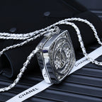 Silver-tone rhinestone pendant necklace with side profile and link chain