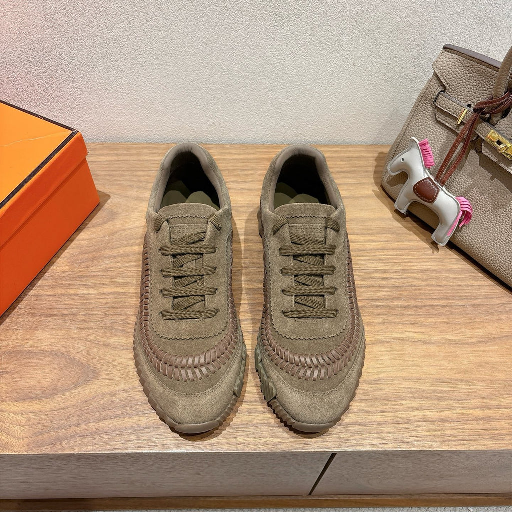 Olive suede sneakers with lace-up front and textured rubber sole