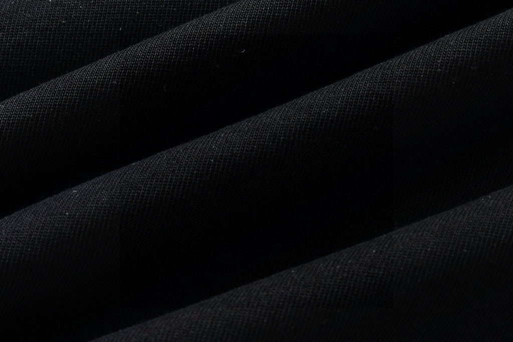 Black knit T-shirt fabric texture close-up
