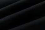 Black knit T-shirt fabric texture close-up
