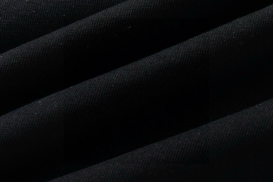 Black knit T-shirt fabric texture close-up