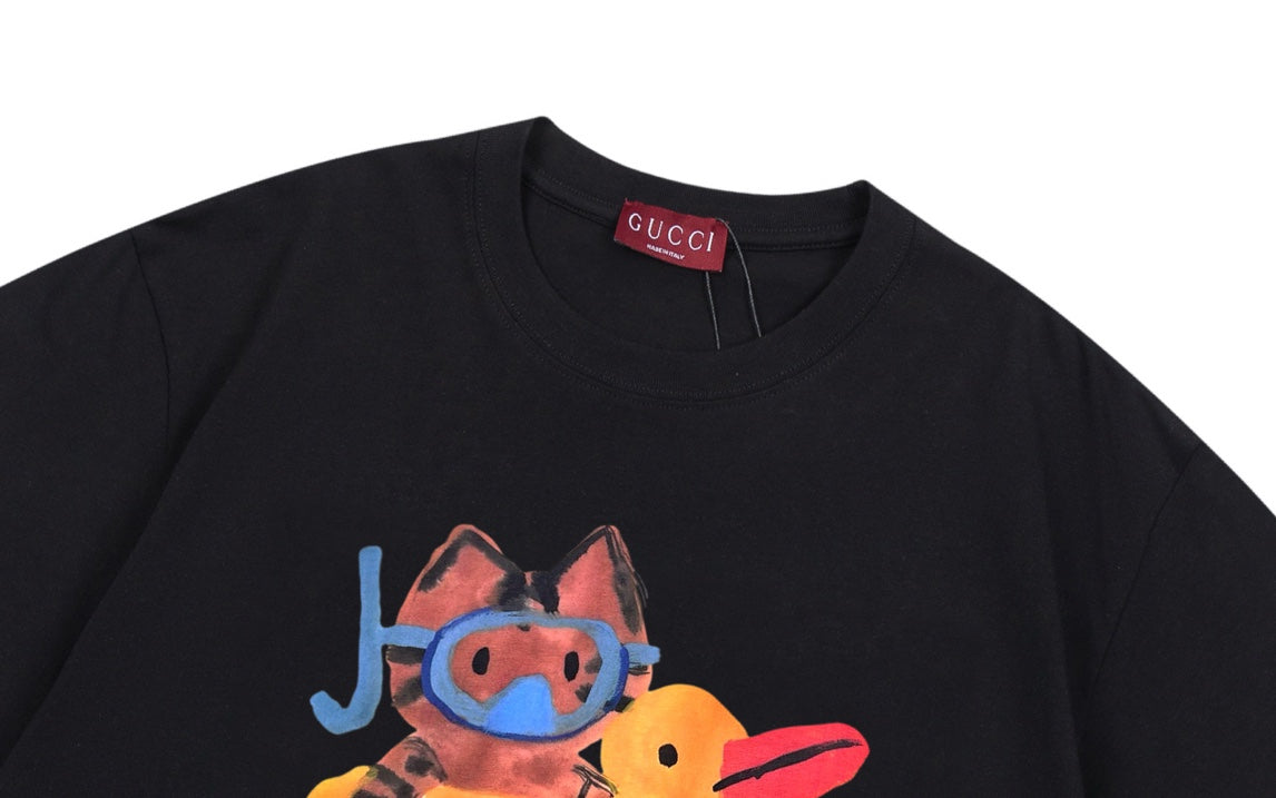 Black Gucci T-shirt neckline with small red Gucci tag and colorful character graphic