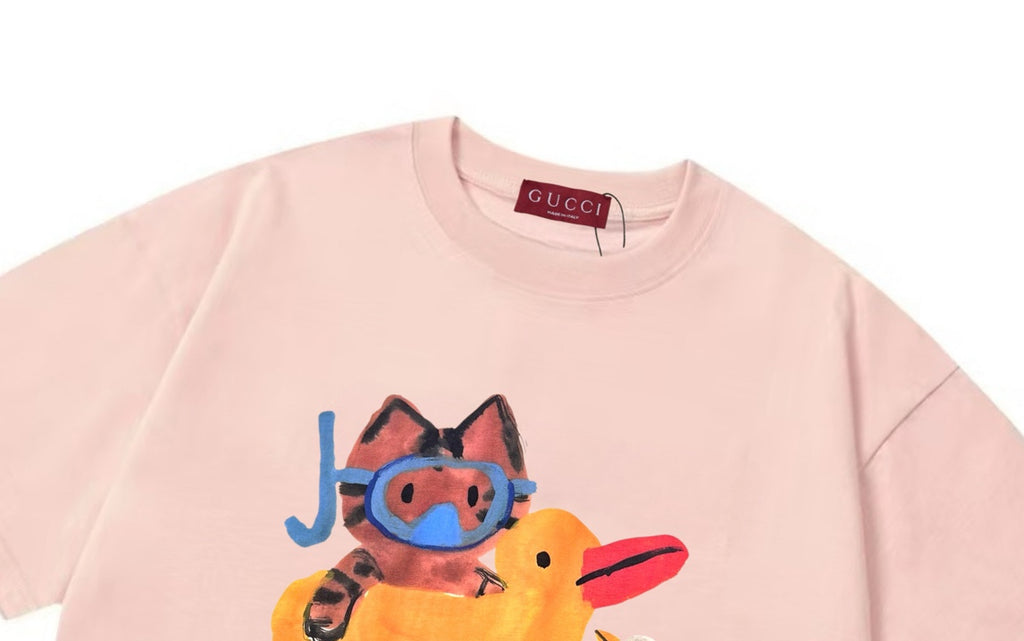 Pink short-sleeve T-shirt with Gucci label at crew neckline