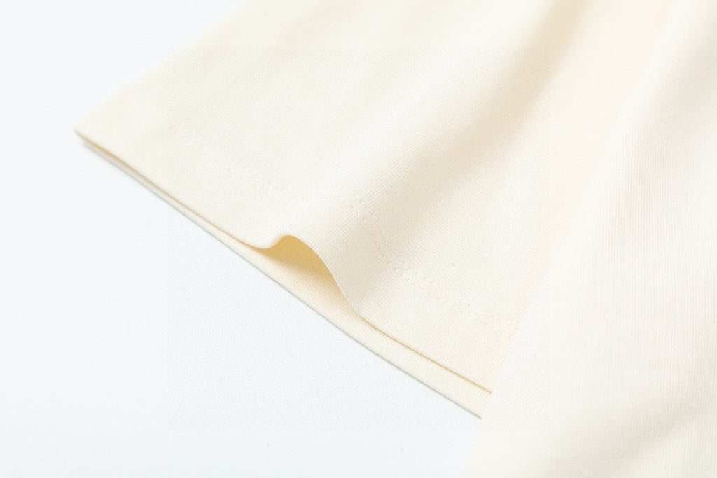 Gucci cream T-shirt fabric with short sleeve drape, side view