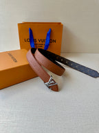 Louis Vuitton belt set with brown and dark monogram straps and silver-tone LV buckle.