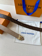 Beige monogram belt with gold-tone LV buckle on dark monogram back