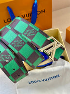 Louis Vuitton belt with green check strap and silver LV buckle, angled view