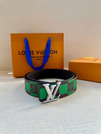 Louis Vuitton belt with green check strap and silver LV buckle on dark leather base