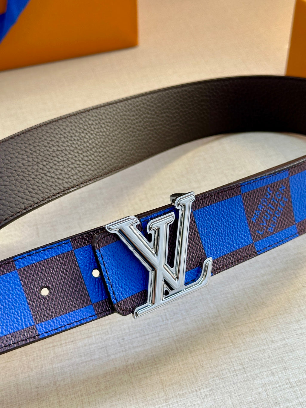 Louis Vuitton belt buckle close-up on blue and black checked strap