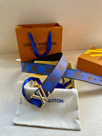Louis Vuitton belt with blue and black checked strap and silver LV buckle