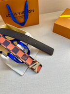 Designer belt displayed with silver buckle on check-print strap