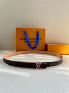 Louis Vuitton monogram belt with tan strap and pink LV buckle