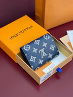 Blue small wallet with Louis Vuitton monogram and butterfly motifs, flap closure