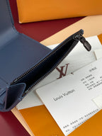 Blue zip-around wallet edge with metal zipper and interior lining, partially open