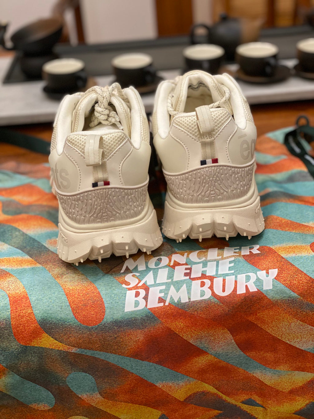 Moncler luxury shoes white lace-up sneakers, back view with heel pull tab
