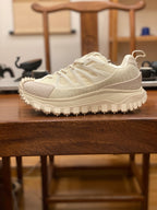 Moncler luxury shoes white lace-up runner style with side straps and chunky rubber sole