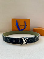 Louis Vuitton belt with navy monogram canvas and silver LV buckle