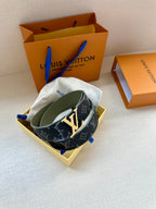 Louis Vuitton belt in box: navy monogram strap with silver LV buckle