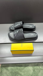 Fendi slide sandals with dark wide band strap and molded platform sole