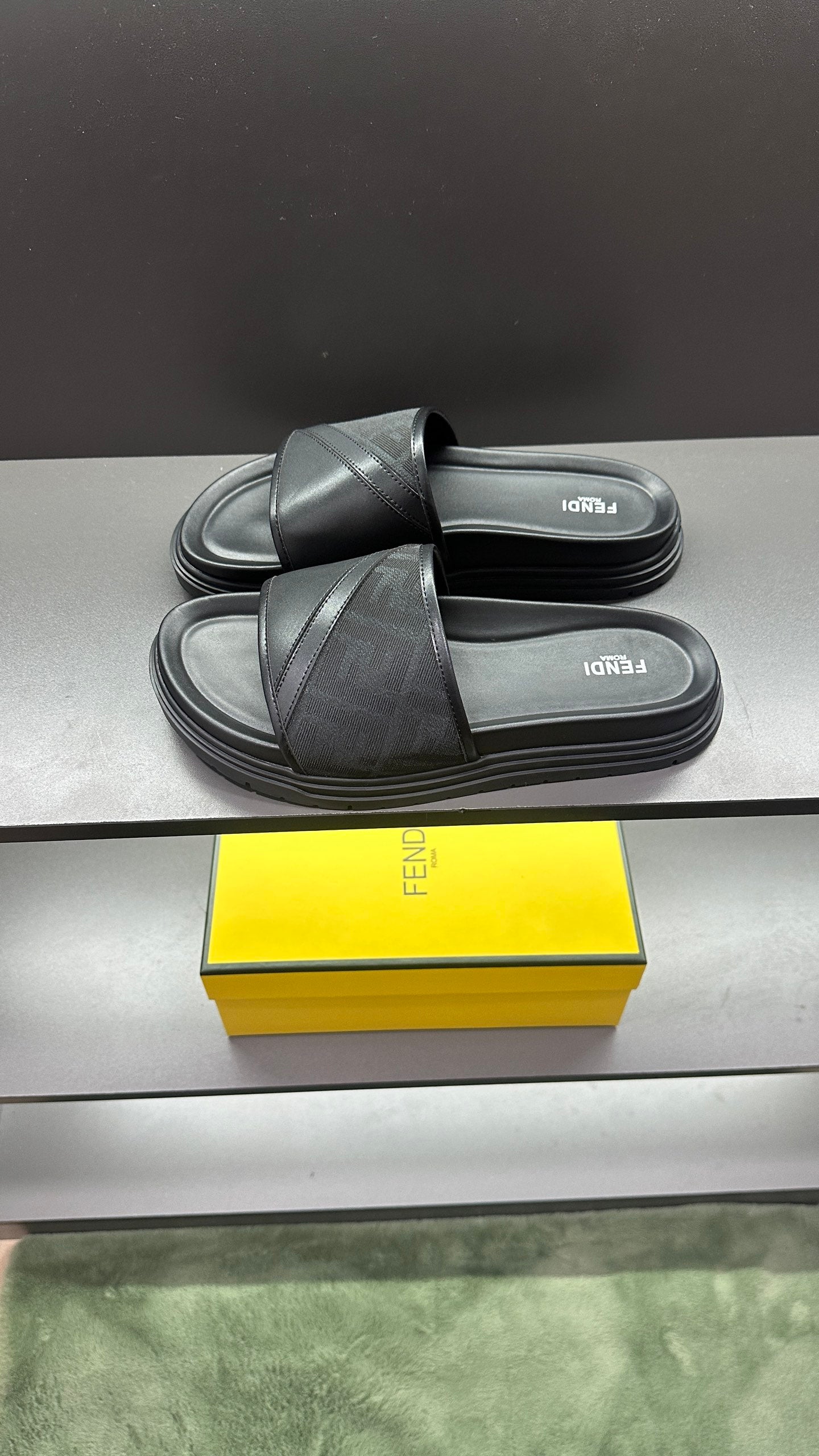 Fendi slide sandals with dark wide band strap and molded platform sole