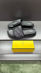 Dark slide sandals with FF logo strap across the front