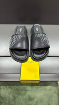 Dark slide sandals with FF logo straps and contoured footbed
