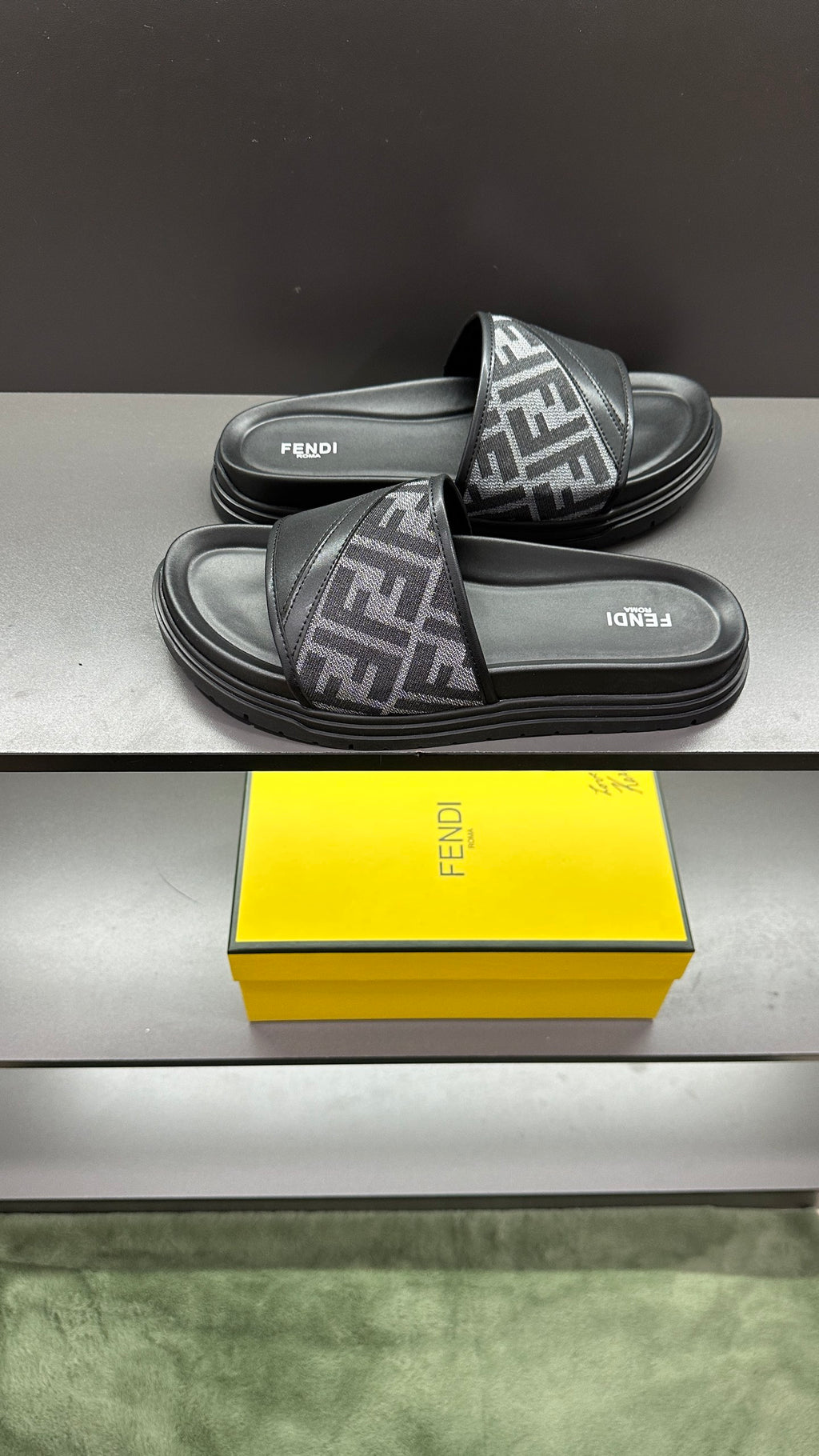 Dark slide sandals with FF logo band and thick platform sole