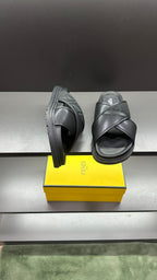 Fendi black slide sandals with logo strap and chunky sole