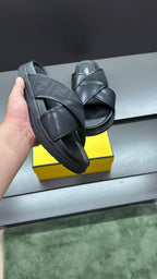 Fendi black slide sandals with thick sole and wide leather straps
