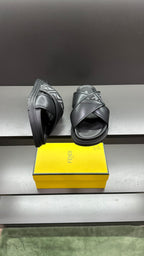Fendi leather platform sandals with FF logo upper and crisscross strap, black
