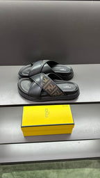 Fendi black slide sandals with crisscross strap and FF logo insole