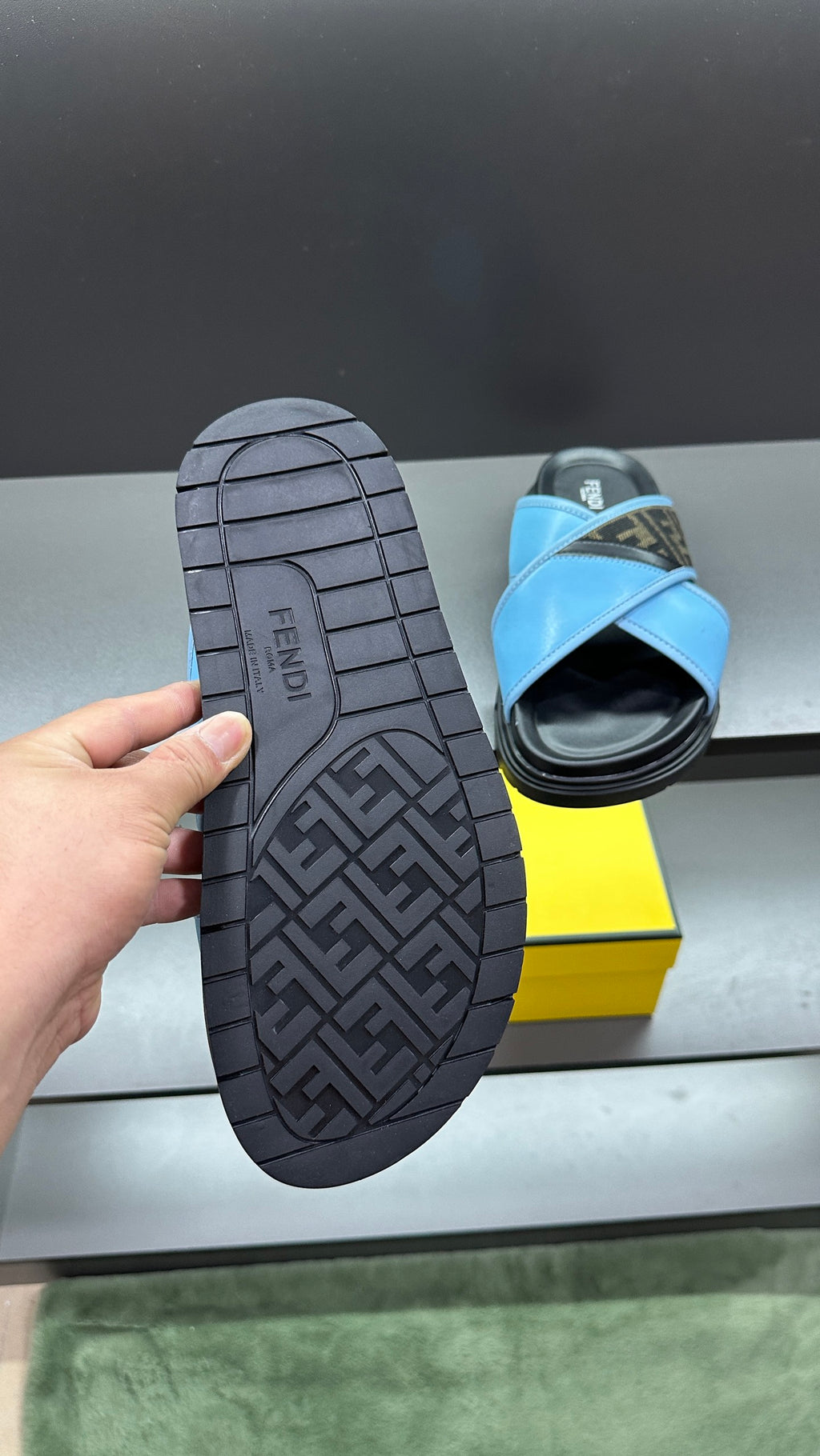 Fendi sandals with textured tread outsole and blue upper, viewed from the bottom