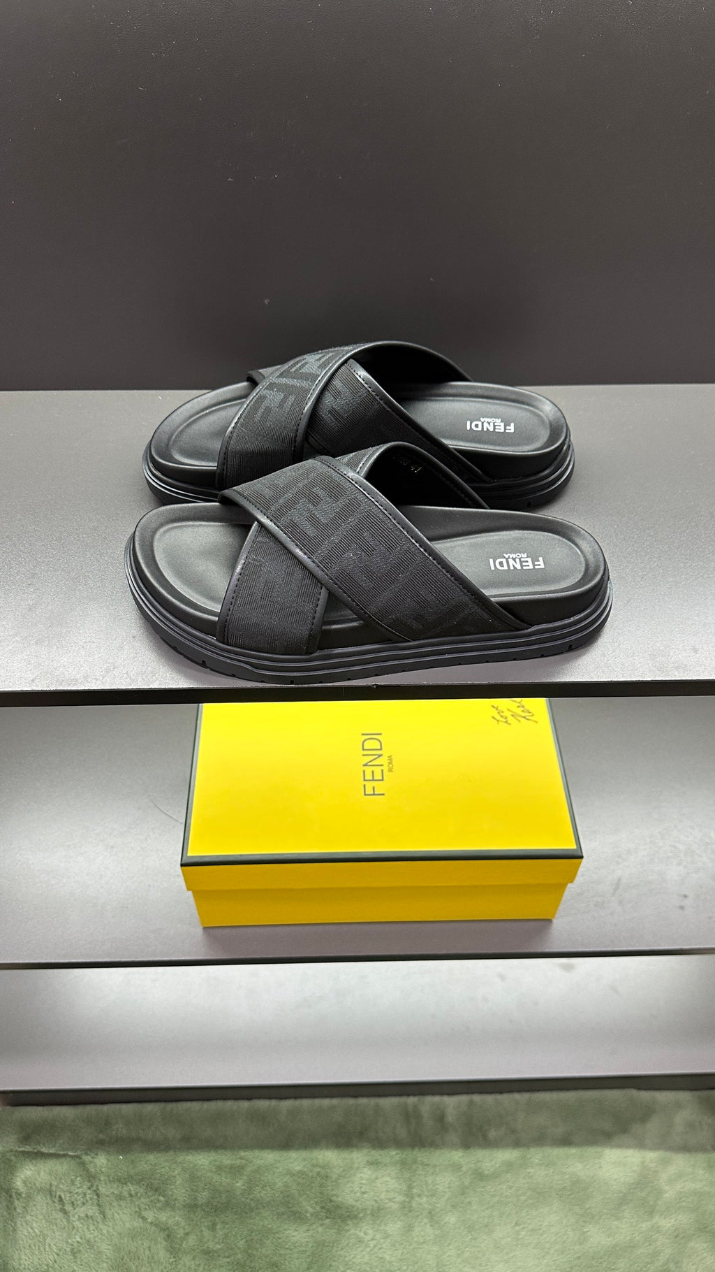 Fendi FF-print slide sandals with wide cross strap and dark molded rubber sole
