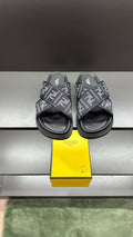 Fendi FF logo slide sandals with dark gray straps and molded dark soles