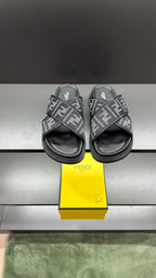 Fendi FF logo slide sandals with dark gray straps and molded dark soles