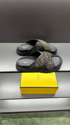 Fendi slide sandals, side view, FF logo monogram straps on dark sole