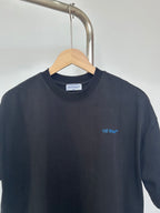 Dark T-shirt neckline with small Off-White chest logo print