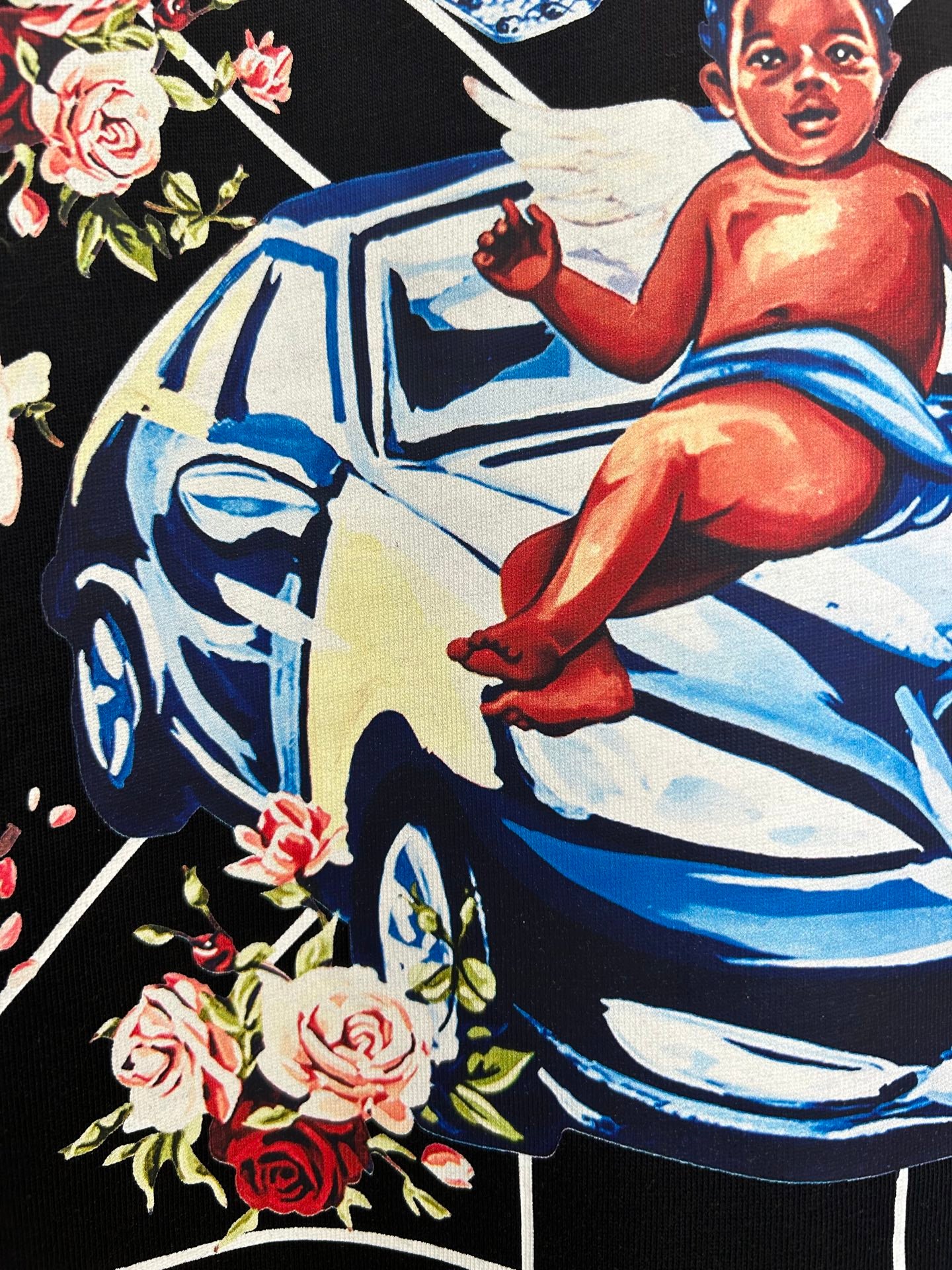 Off-White dark T-shirt graphic close-up with kneeling woman and roses