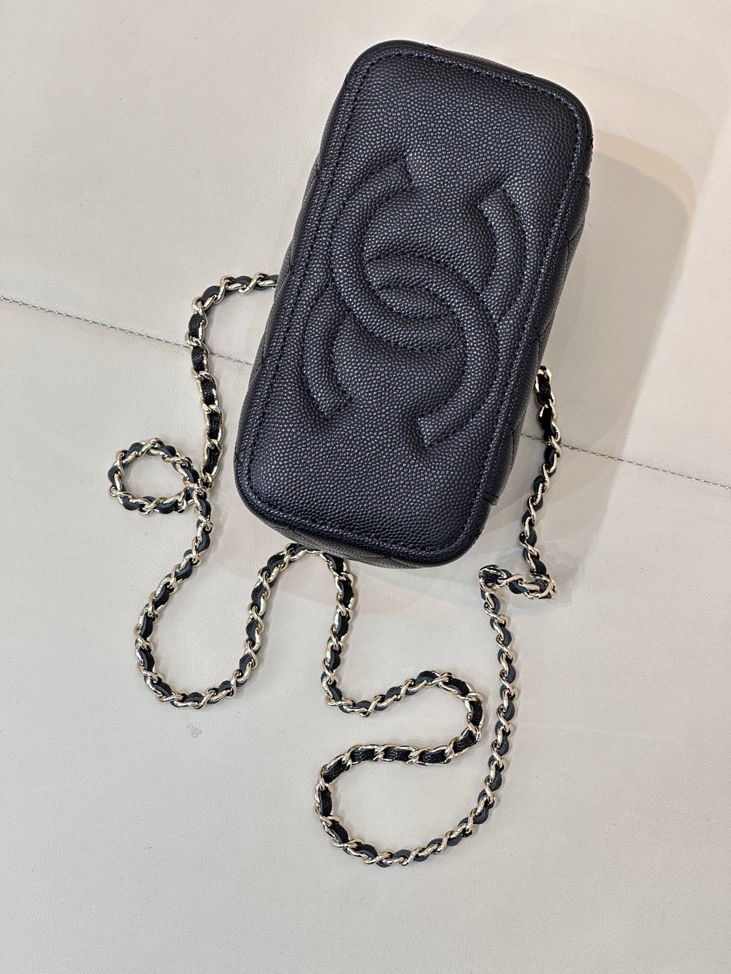 Chanel quilted mini bag back, dark navy leather with embossed CC and chain
