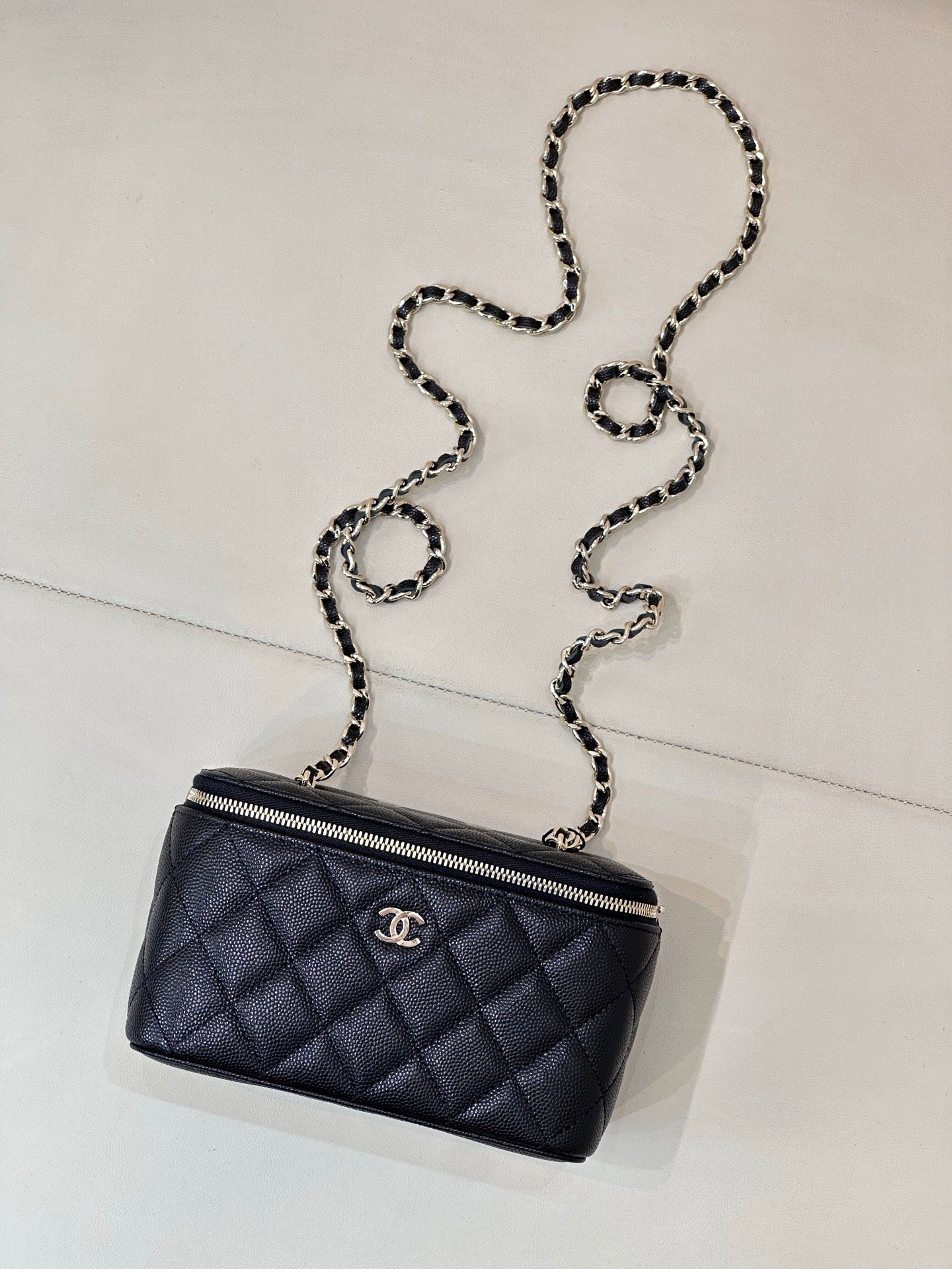 Chanel quilted mini bag with chain strap, dark navy and gold-tone zipper