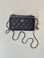 Chanel quilted mini crossbody bag, dark navy, gold-tone zipper front view