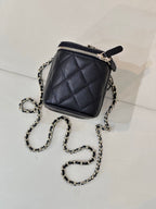 Chanel quilted mini bag, dark navy, chain strap and zip-top with pull tab
