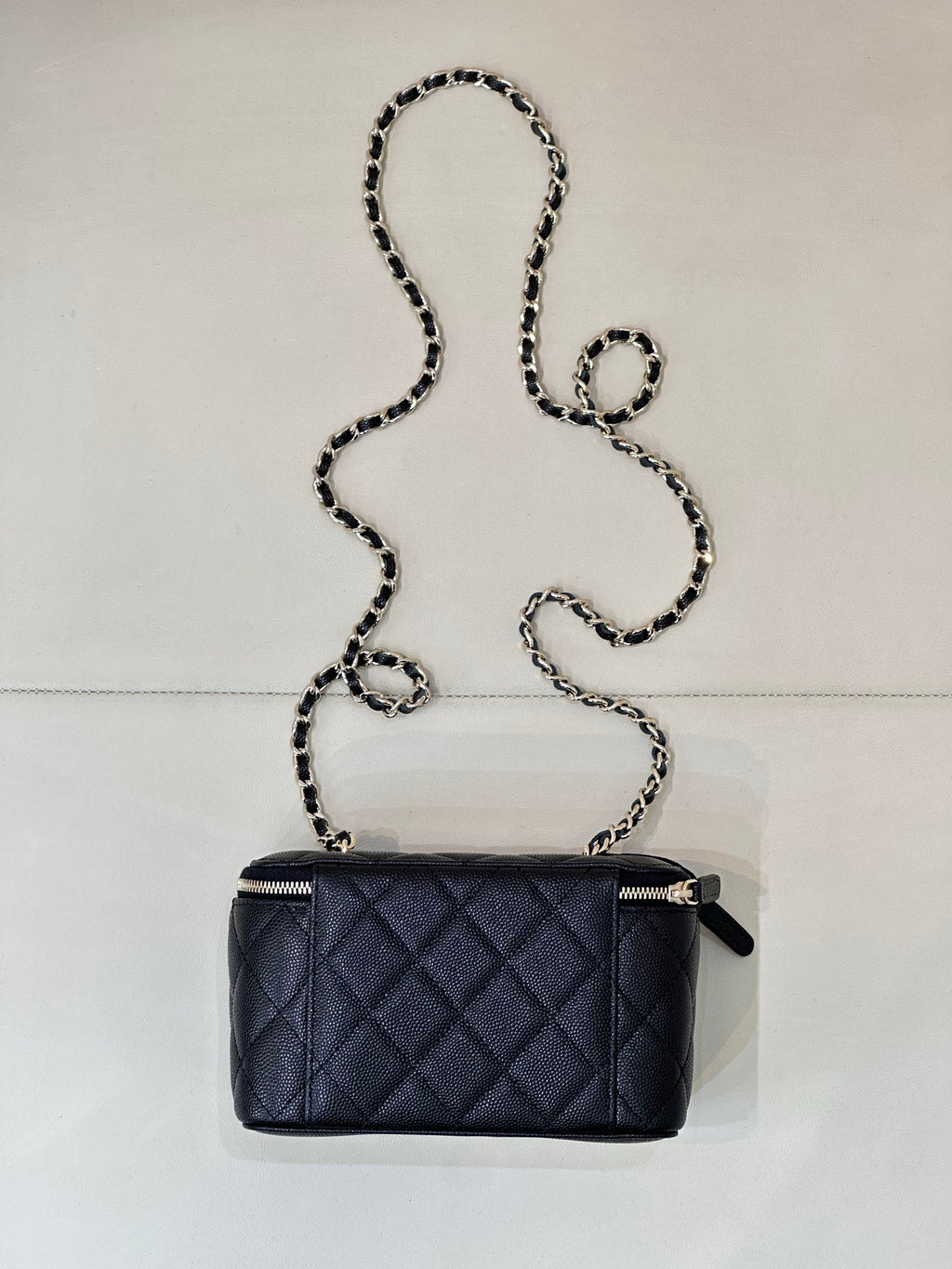 Chanel quilted mini crossbody bag, dark navy, gold-tone zipper and chain strap